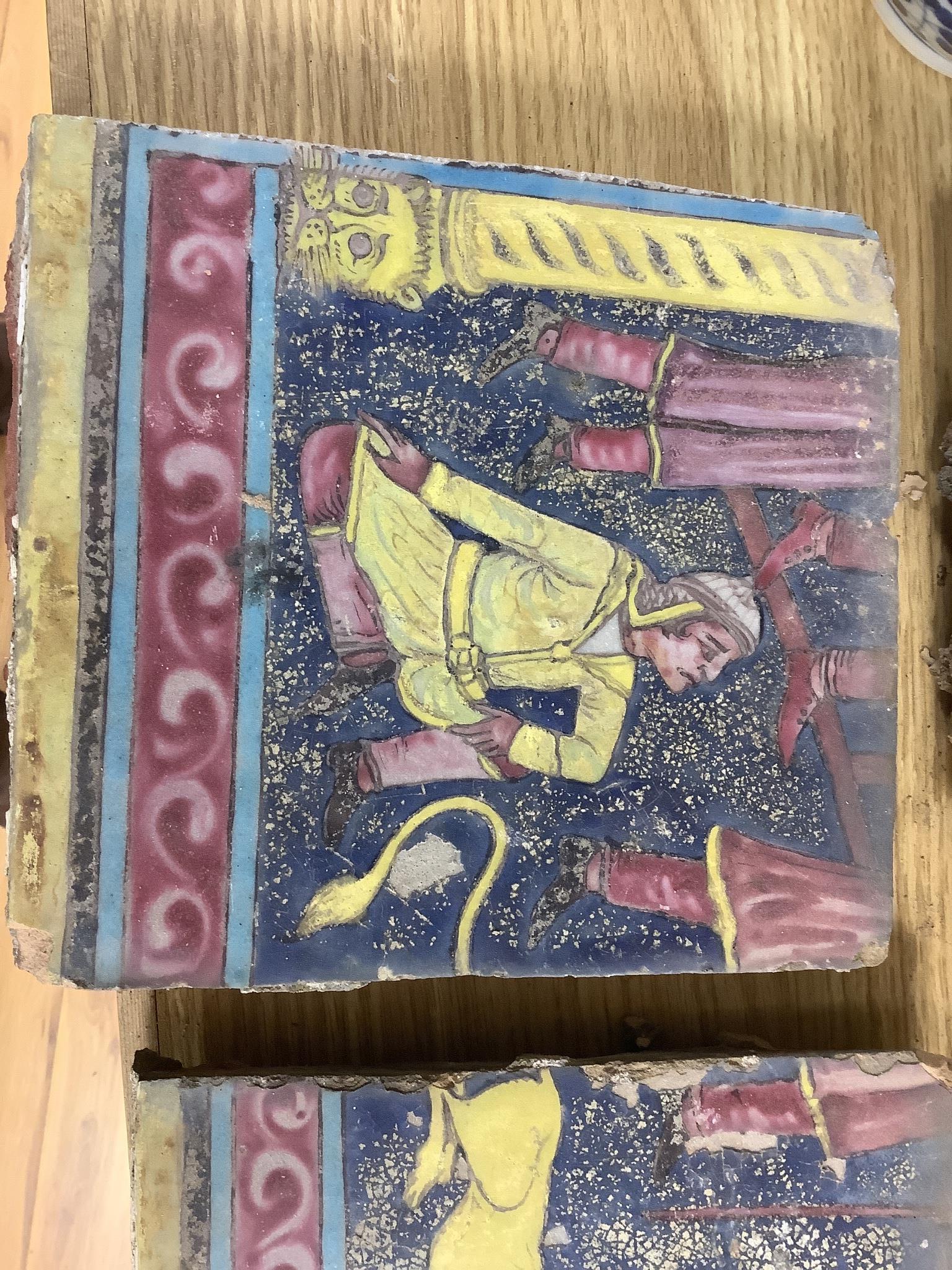 A 20th century Persian painted twelve tile panel.